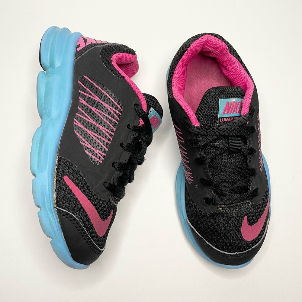 Nike Kids Black and Pink Sneakers with Blue Accents